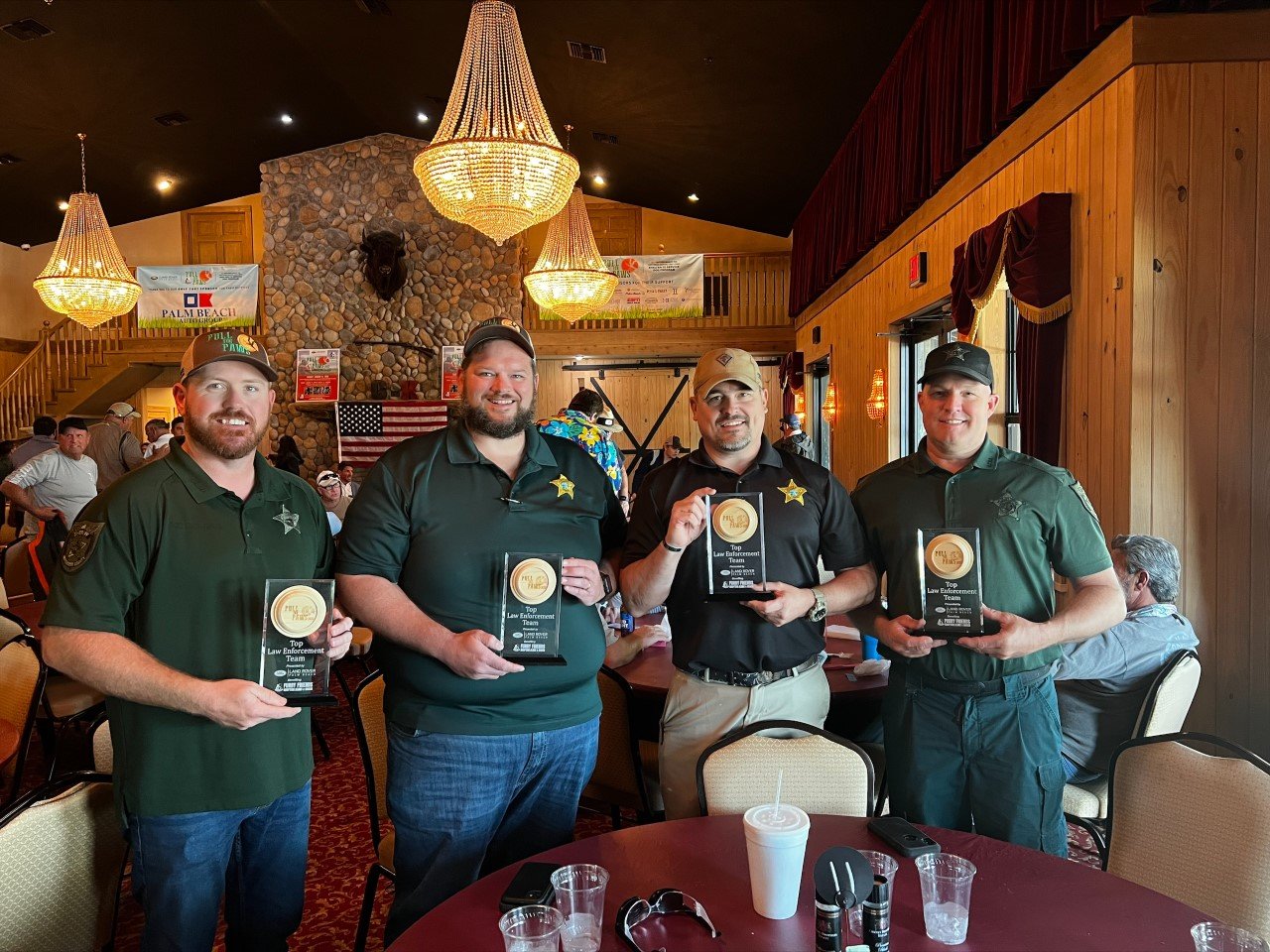 OKEECHOBEE -- Bringing home trophies from the Pull for Paws  event at OK Corral were David Rogers, Ryane Ammons, Jack Nash and Randy Thomas. Thomas was one point away from the top gun with a 94 out of 100 on a challenging windy day.